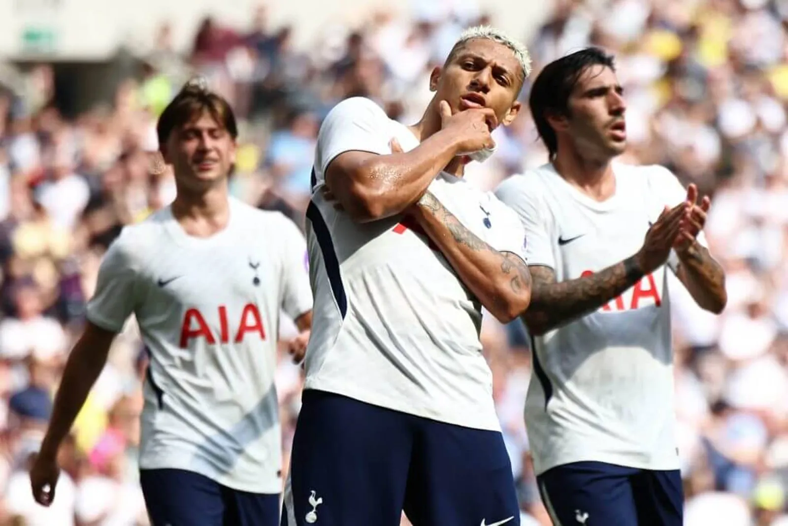 Richarlison poses theatrically as he celebrates scoring